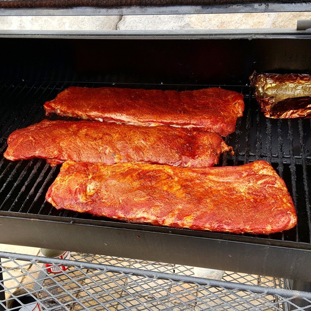Racks of pork ribs on the grill