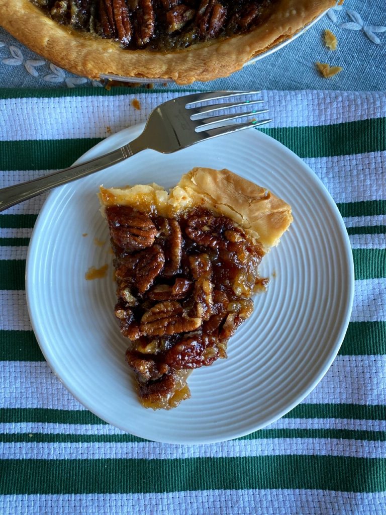 A slice of smoked candied pecan pie