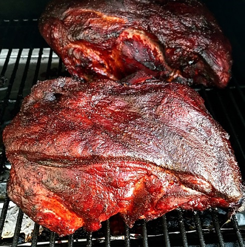 Smoked pork butt on the grill.