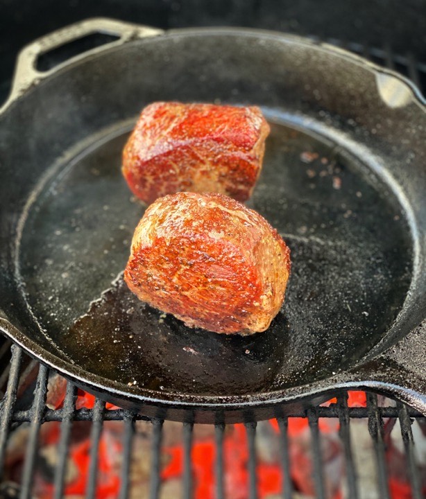Sear the Omaha Cut ribeye steaks in the cast iron skillet to get an even crust all around.