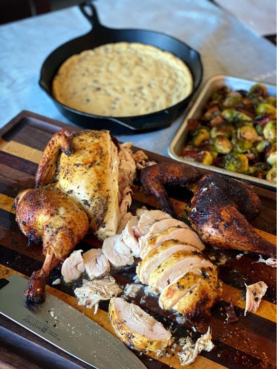 ZESTY GRILLED SPATCHCOCK CHICKEN, ROASTED BACON & BRUSSELS SPROUTS, and SKILLET CHOCOLATE CHIP COOKIE (all on the grill)
