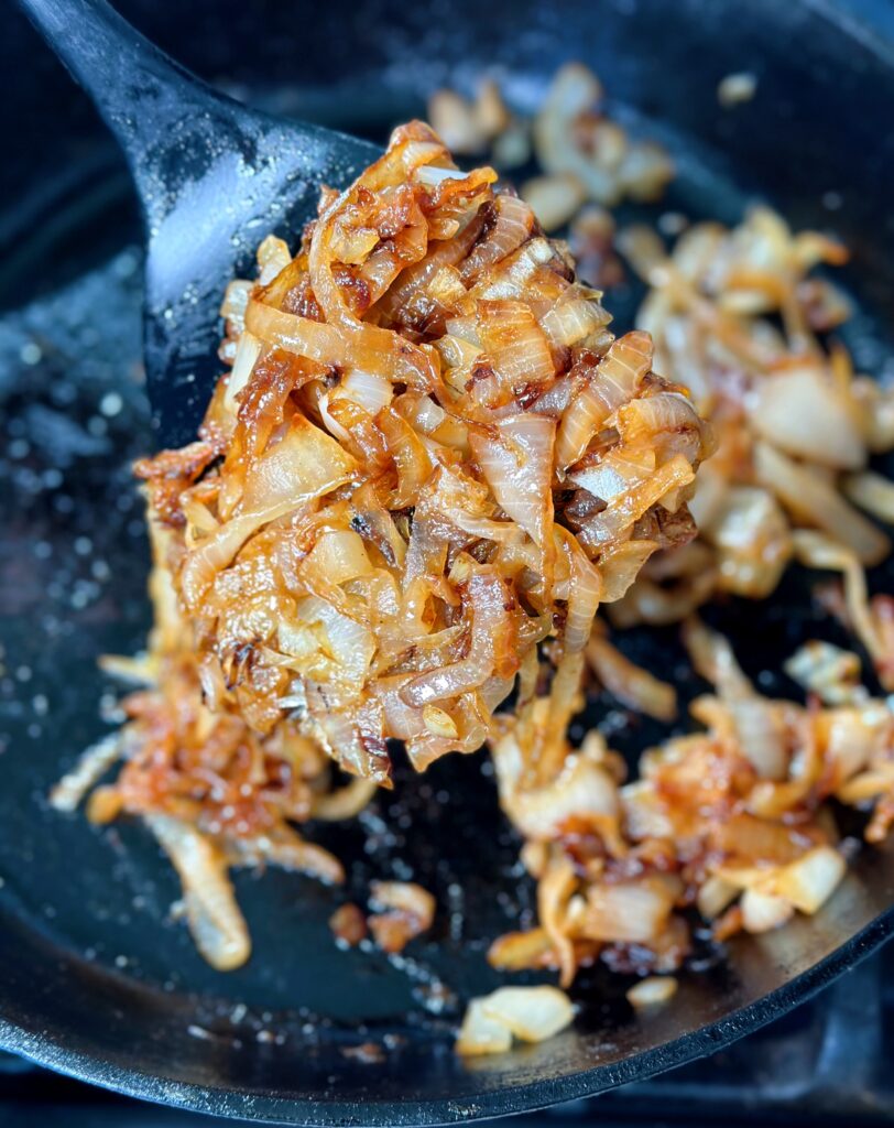Caramelized onions coming off the skillet. 